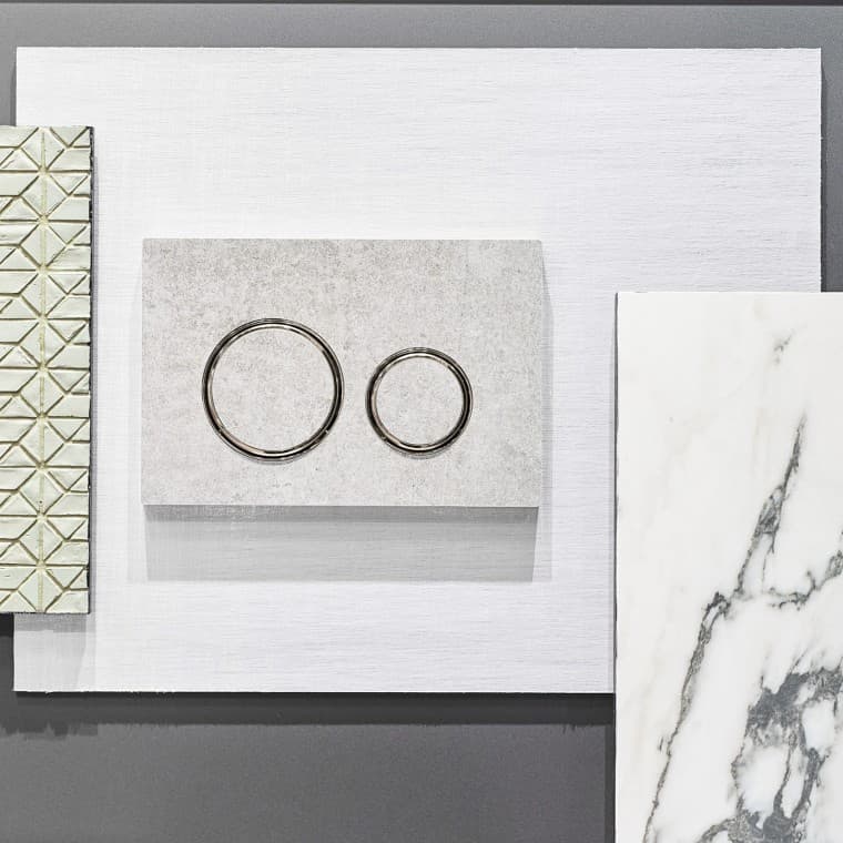 Ovládacie tlačidlo Geberit Sigma 21 v betónovom vzhľade s chrómovanými dizajnovými krúžkami Ovládacie tlačidlo Geberit Sigma 21 v betónovom vzhľade s chrómovanými dizajnovými krúžkami