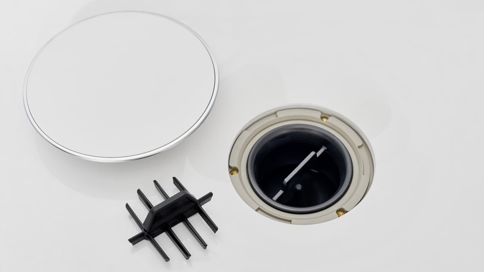 Kryt odtoku a hrebeňová vložka Kryt odtoku a hrebeňová vložka